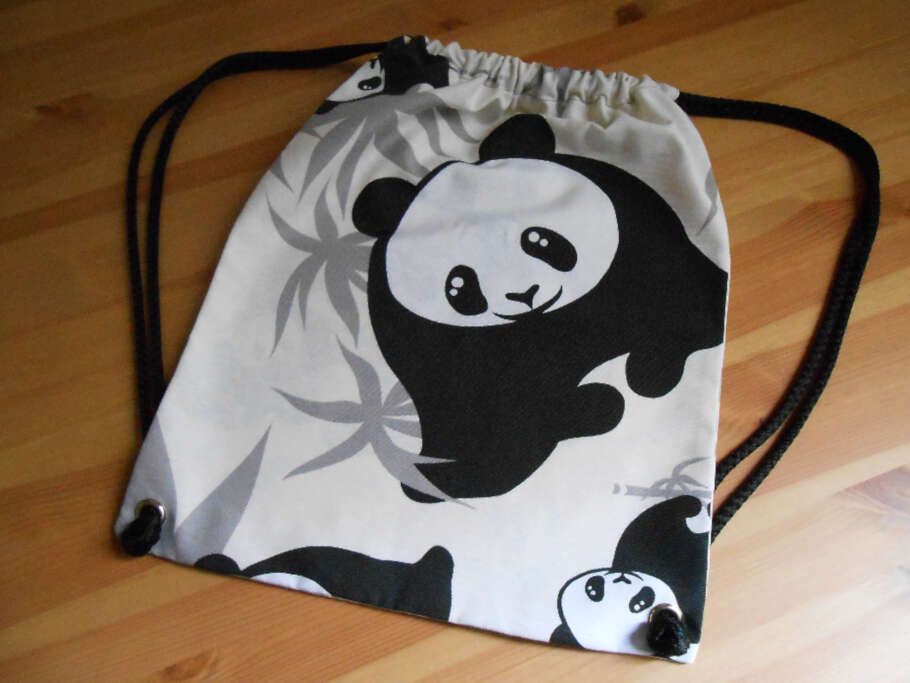 Mochila con cuerdas estampado animales oso panda